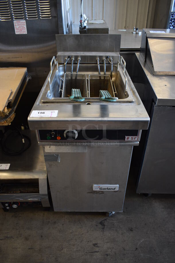 Garland Model S18SF Stainless Steel Commercial Electric Powered Deep Fat Fryer w/ 2 Metal Fry Baskets. 208 Volts, 1/3 Phase. 18x34x43