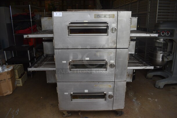 3 Lincoln Impinger Model 1600-015-AL Stainless Steel Commercial Natural Gas Powered Conveyor Pizza Oven on Commercial Casters. Bottom Oven Does Not Have Conveyor Belt. 110,000 BTU. 82x61x66. 3 Times Your Bid!