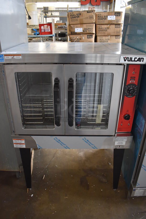 	BRAND NEW SCRATCH AND DENT! LATE MODEL! Vulcan Model VC5GD-11D1Z Stainless Steel Commercial Natural Gas Powered Full Size Convection Oven w/ View Through Doors, Metal Oven Racks and Thermostatic Controls on Metal Legs. 40x32x55. Tested and Working!