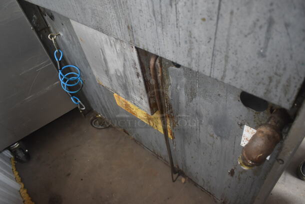 Garland SunFire Stainless Steel Commercial Natural Gas Powered 6 Burner Range w/ Oven and Back Splash on Commercial Casters.  - Image 8 of 8