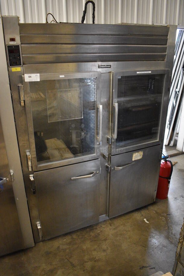 Traulsen Model RHT 2-32WUT Stainless Steel Commercial 4 Half Size Door Reach In Cooler. 115 Volts, 1 Phase. 58x36x77. Cannot Test - Unit Was Previously Hardwired