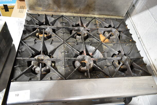 Radiance Stainless Steel Commercial Natural Gas Powered 6 Burner Range w/ Oven, Over Shelf and Back Splash on Commercial Casters. 2 Casters Need To Be Reattached. - Image 2 of 5