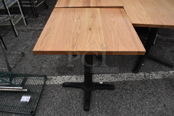 2 Wooden Dining Table on Black Metal Table Base. 24x24x28.5. 2 Times Your Bid!