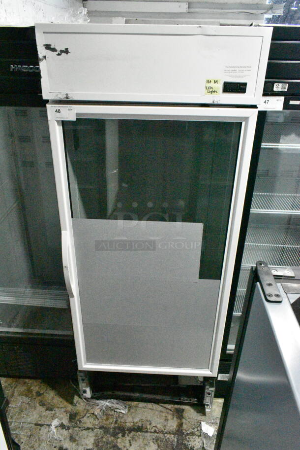 2021 True TSCI-600R-G-PH Metal Commercial Single Door Reach In Cooler Merchandiser. 115 Volts, 1 Phase. Tested and Powers On But Does Not Get Cold
 - Image 1 of 6