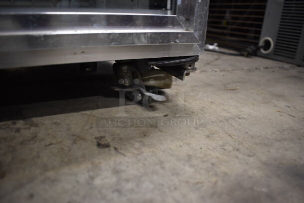True GDM-07F Commercial Stainless Steel Countertop Merchandiser Freezer With Polycoated Shelves On Commercial Casters With Black Cabinet. 115V, 1 Phase. Tested and Powers On But Does Not Get Cold - Image 6 of 8