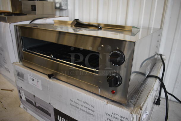 IN ORIGINAL BOX! Avantco 177CPO16TSGL Stainless Steel Commercial Countertop Electric Powered Pizza / Snack Oven w/ Thermostatic Controls. Used a Few Times at Trade Show. 120 Volts, 1 Phase. 24x20x8. Tested and Working! - Image 2 of 8