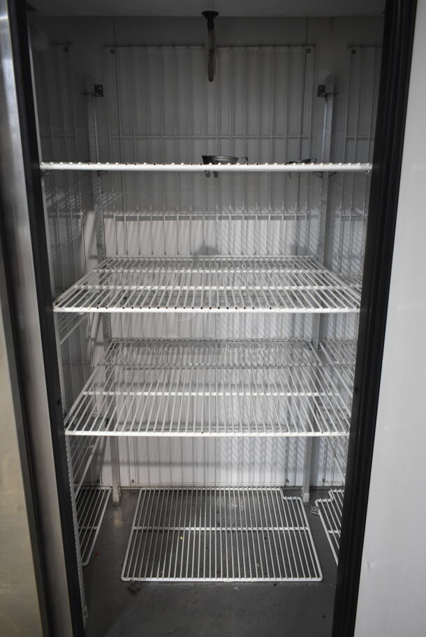 True T-72F Stainless Steel Commercial 3 Door Reach In Freezer w/ Poly Coated Racks on Commercial Casters. 115/208-230 Volts, 1 Phase.   - Image 7 of 10