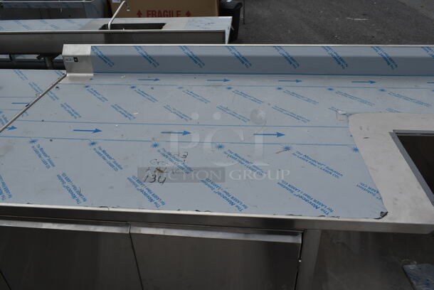 BRAND NEW SCRATCH AND DENT! Stainless Steel Commercial Counter w/ 2 Doors and Back Splash. - Image 5 of 7
