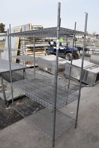 Gray Finish 4 Tier Wire Shelving Unit. BUYER MUST DISMANTLE. PCI CANNOT DISMANTLE FOR SHIPPING. PLEASE CONSIDER FREIGHT CHARGES. 48x24x74