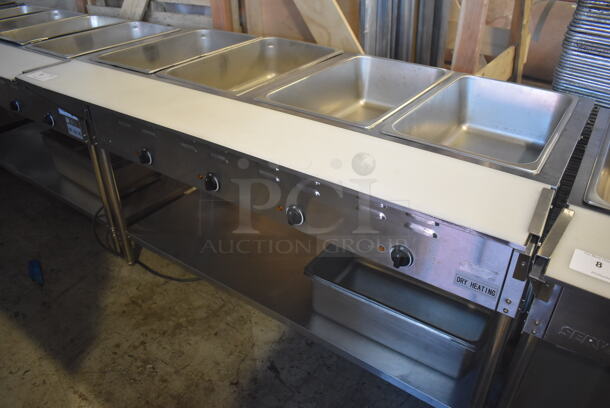 ServIt 423EST4WE750 Stainless Steel Commercial Electric Powered 4 Bay Electric Powered Steam Table w/ Drop Ins, Cutting Board and Under Shelf. 208/240 Volts. 58x30x33