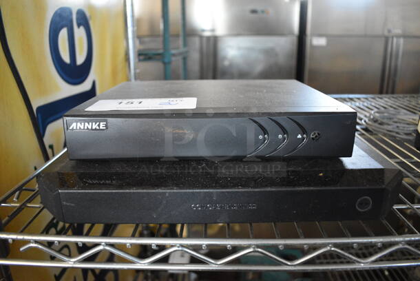 2 Various Items; Annke Model DN81R Camera Security Console and CBR-T Router. 10x9x2, 13x9x2. 2 Times Your Bid!