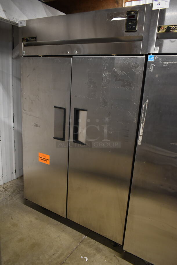 True TG2R-2S ENERGY STAR Stainless Steel Commercial 2 Door Reach In Cooler w/ Poly Coated Racks on Commercial Casters. 115 Volts, 1 Phase. Tested and Working! - Image 1 of 8