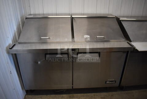 2016 Migali C-SP60-24BT Stainless Steel Commercial Sandwich Salad Prep Table Bain Marie Mega Top on Commercial Casters. 115 Volts, 1 Phase. 60.5x34x47. Tested and Powers On But Temps at 55 Degrees