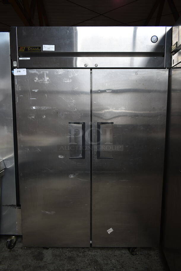 2012 True TG2R-2S ENERGY STAR Stainless Steel Commercial 2 Door Reach In Cooler w/ Poly Coated Racks on Commercial Casters. 115 Volts, 1 Phase. Tested and Working! - Image 1 of 8