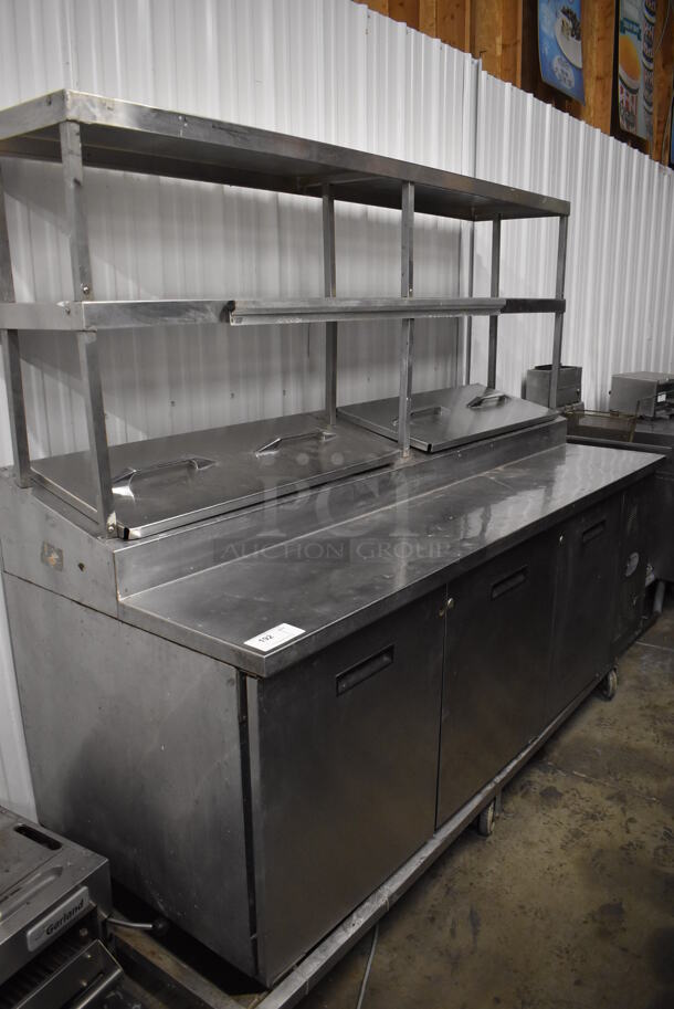 Randell 8383N Stainless Steel Commercial Prep Table w/ Drop In Bins and 2 Over Shelves on Commercial Casters. 115 Volts, 1 Phase. 83x33x73. Tested and Working!