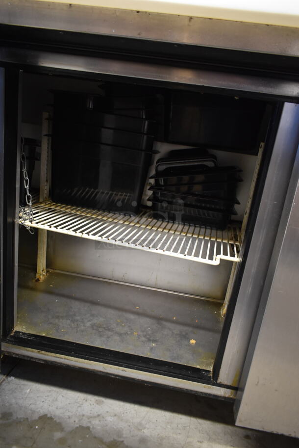 True TSSU-72-18 Stainless Steel Commercial Sandwich Salad Prep Table Bain Marie Mega Top w/ Black Poly Drop In Bins on Commercial Casters. 115 Volts, 1 Phase. Tested and Powers On But Does Not Get Cold - Image 6 of 8