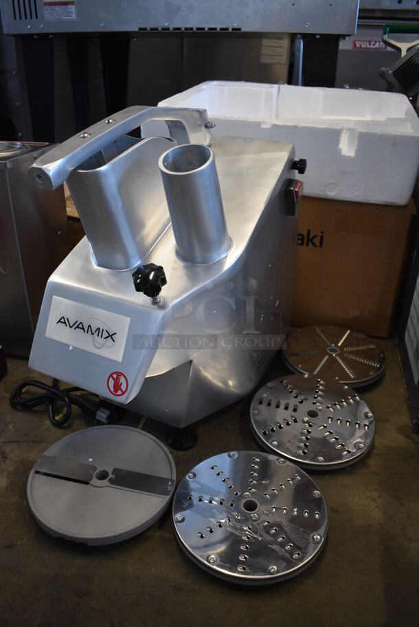 BRAND NEW SCRATCH AND DENT! Avamix CFP5D Stainless Steel Commercial Continuous Feed Food Processor w/ 5 Various Blades. 120 Volts, 1 Phase. 11x21x21. Tested and Working!