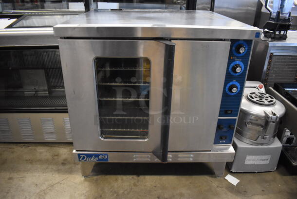 Duke 611-32V Stainless Steel Commercial Electric Powered Full Size Convection Oven w/ View Through Door, Solid Door, Metal Oven Racks and Thermostatic Controls. 38x42x39.5