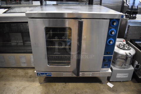 Duke 611-32V Stainless Steel Commercial Electric Powered Full Size Convection Oven w/ View Through Door, Solid Door, Metal Oven Racks and Thermostatic Controls. 38x42x39.5