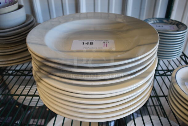 11 White Ceramic Pasta Plates. Includes 11.75x11.75x2. 11 Times Your Bid!