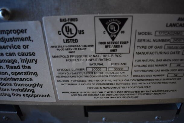 BRAND NEW SCRATCH AND DENT! 2021 Avantco 177CAG24MG Stainless Steel Commercial Countertop Natural Gas Powered Flat Top Griddle.  - Image 7 of 8