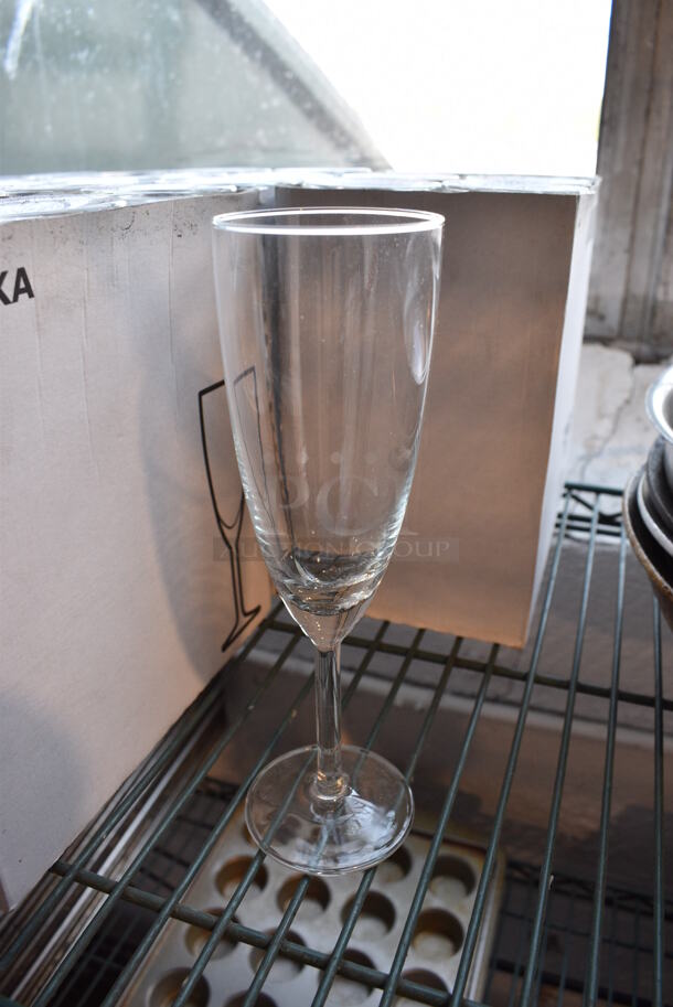 55 BRAND NEW! Svalka Champagne Flute Glasses. 2.5x2.5x8.5. 55 Times Your Bid!