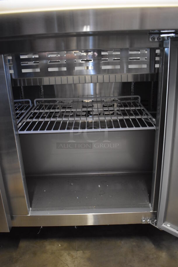BRAND NEW SCRATCH AND DENT! Avantco 178SSPT71MHC Stainless Steel Commercial Sandwich Salad Prep Table Bain Marie Mega Top on Commercial Casters. 115 Volts, 1 Phase. Tested and Working! - Image 6 of 10