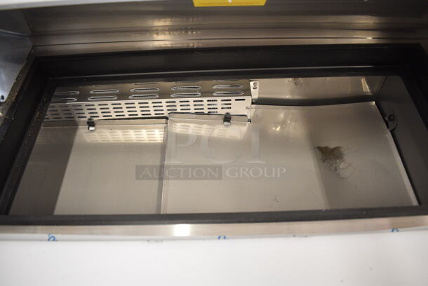BRAND NEW SCRATCH AND DENT! 2024 Avantco 447APST72 Stainless Steel Commercial Sandwich Salad Prep Table Bain Marie Mega Top on Commercial Casters. 115 Volts, 1 Phase. Tested and Working! - Image 4 of 10