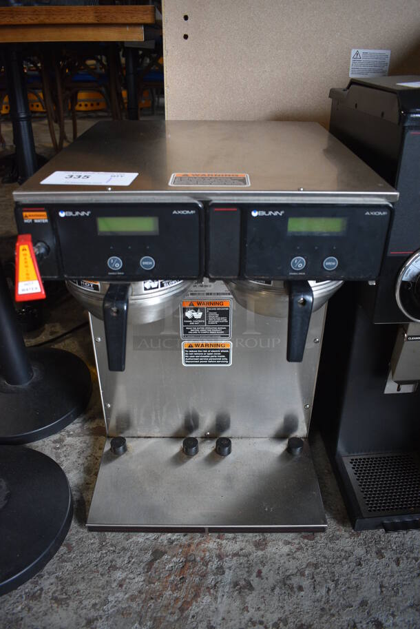 2018 Bunn Model AXIOM TWIN APS Stainless Steel Commercial Countertop Coffee Machine w/ Hot Water Dispenser and 2 Metal Brew Baskets. 120/240 Volts, 1 Phase. 16x19x24