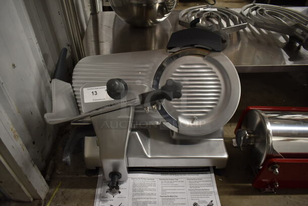 BRAND NEW SCRATCH AND DENT! 2023 Hobart Centerline EDGE12-11 Stainless Steel Commercial Countertop 12" Manual Meat Slicer w/ Blade Sharpener. 115 Volts, 1 Phase. Tested and Working! - Image 2 of 9