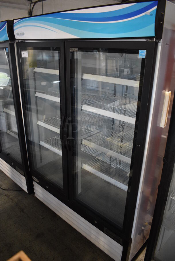 Serv-Ware GR-48 ENERGY STAR Metal Commercial 2 Door Reach In Cooler Merchandiser w/ Poly Coated Racks on Commercial Casters. 115 Volts, 1 Phase. 54x32x82. Tested and Working!