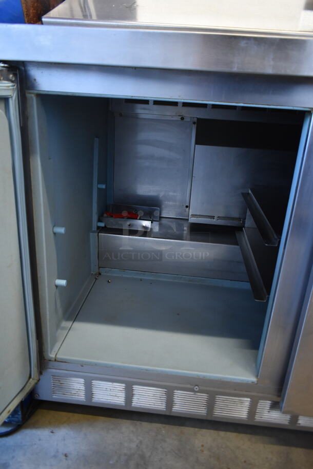 Delfield Stainless Steel Commercial Sandwich Salad Prep Table Bain Marie Mega Top on Commercial Casters. 115 Volts, 1 Phase. Tested and Powers On But Does Not Get Cold  - Image 5 of 9