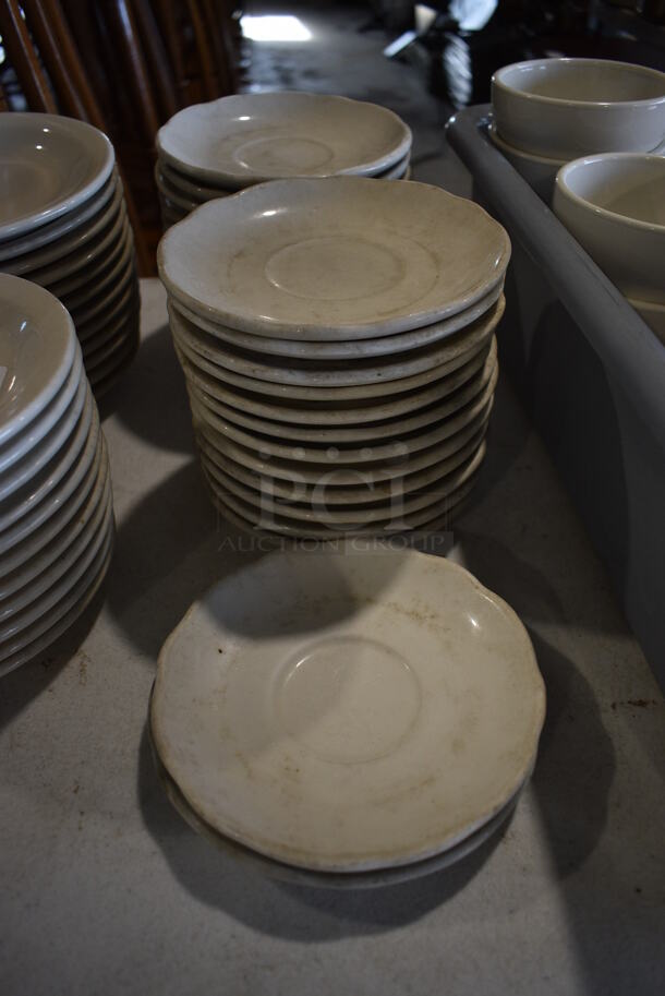 27 White Ceramic Saucers. 5.5x5.5x1. 27 Times Your Bid!