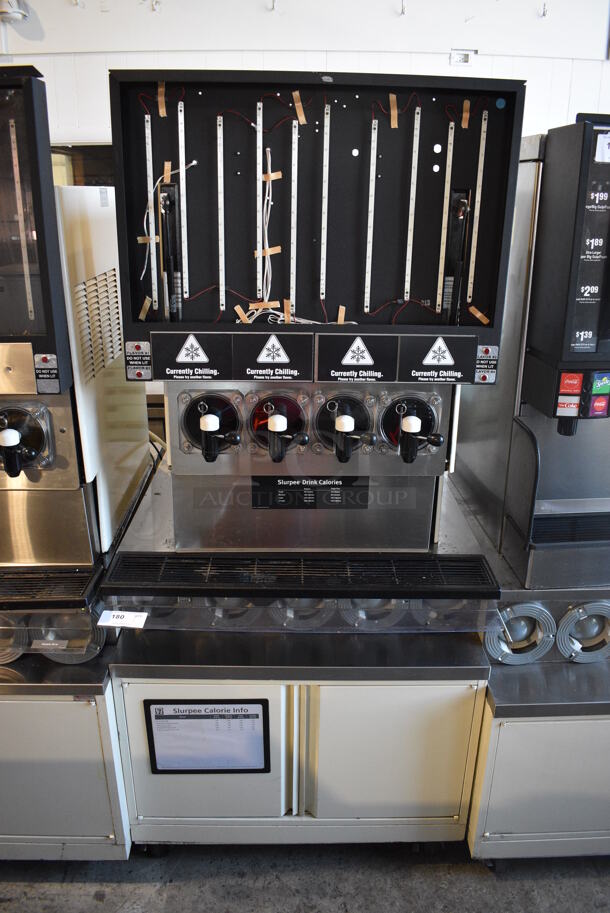 FBD Model FBD564 RC Stainless Steel Commercial Countertop 4 Flavor Slushie Machine on Stainless Steel Soda Station w/ 5 Cup Dispensers and 2 Doors. 208-230 Volts, 1 Phase. 36x42x79 - Image 1 of 8