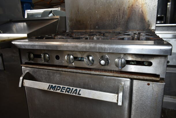 Imperial Stainless Steel Commercial Natural Gas Powered 6 Burner Range w/ Oven and Back Splash on Commercial Casters. - Image 4 of 6