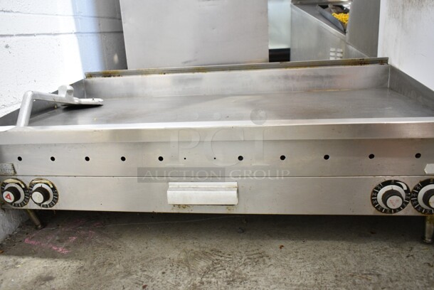 Vulcan Stainless Steel Commercial Countertop Natural Gas Powered Flat Top Griddle w/ Scraper.  - Image 4 of 4