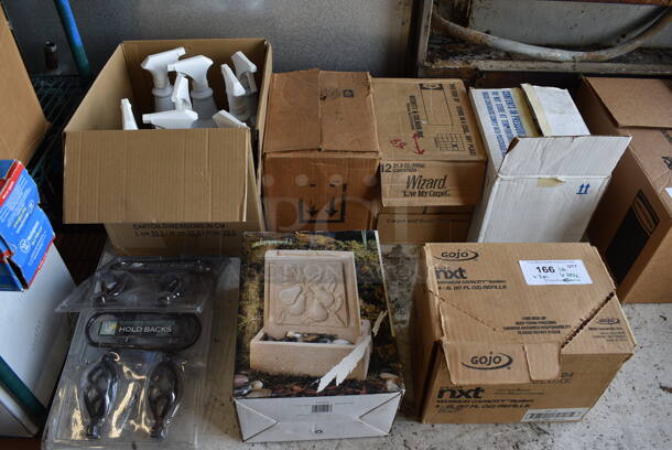 ALL ONE MONEY! Lot of 6 Boxes of Various Items Including Gojo Refills, Somerset Bright Citrus Air Freshener, Wizard Carpet Odor Neutralizer, Stainless Steel Cleaner, Stone Pattern Garden Fixture and 3 Holdbacks Curtain Units.
