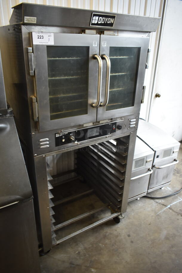 Doyon JA4 Stainless Steel Commercial  Oven w/ Lower Pan Rack on Commercial Casters. 120/208 Volts, 3 Phase.  - Image 1 of 6