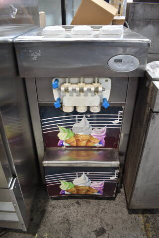 2013 Stainless Steel Commercial 2 Flavor w/ Twist Soft Serve Ice Cream Machine on Commercial Casters. 220 Volts. 
