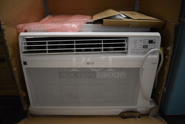 BRAND NEW SCRATCH AND DENT! LG LW1022ERSM Metal Window Mount Air Conditioner. 115 Volts, 1 Phase. 24x22x18