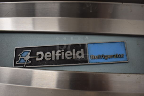 Delfield Stainless Steel Commercial 3 Door Reach In Cooler w/ Poly Coated Racks on Commercial Casters. 77x34x80. Tested and Working! - Image 8 of 9