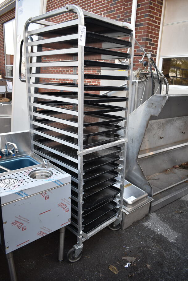 Metal Commercial Pan Transport Rack w/ 17 Black Trays on Commercial Casters. - Image 1 of 3