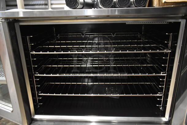 BRAND NEW SCRATCH AND DENT! Mainstreet Stainless Steel Commercial Electric Powered Full Size Convection Oven w/ View Through Doors, Metal Oven Racks and Thermostatic Controls. Comes w/ Metal Legs. 208 Volts, 1/3 Phase. - Image 5 of 7