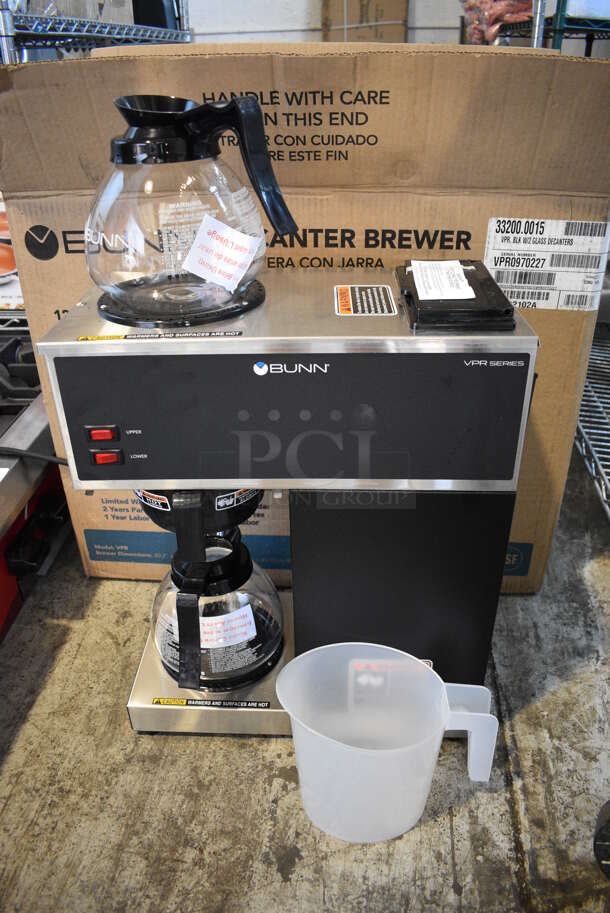 BRAND NEW IN BOX! 2021 Bunn Model VPR Stainless Steel Commercial 2 Burner Coffee Machine w/ 2 Coffee Pots, Poly Brew Basket and Poly Pitcher. 120 Volts, 1 Phase. 16x8x18