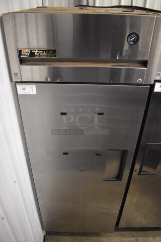2011 True TG1R-1S Stainless Steel Commercial Single Door Reach In Cooler w/ Poly Coated Racks on Commercial Casters. 115 Volts, 1 Phase. 29x35x83. Tested and Working!