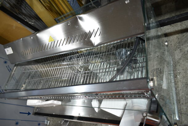 BRAND NEW SCRATCH AND DENT! ServIt 423HDM48SA Stainless Steel Commercial Countertop Full Service Heated Merchandiser Display Case. See Pictures for Damage. 120 Volts, 1 Phase. Tested and Working!
 - Image 5 of 7