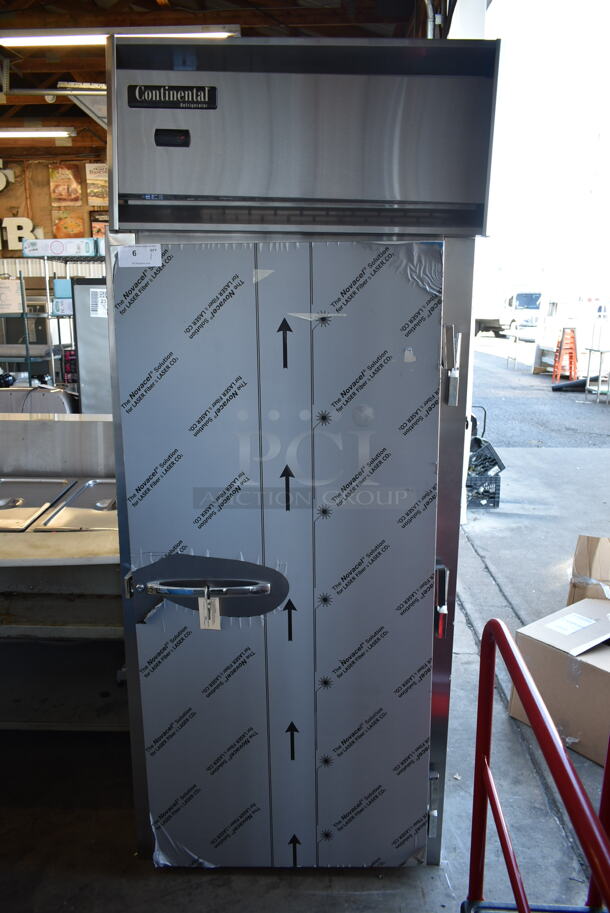 BRAND NEW SCRATCH AND DENT! 2022 Continental D1RINSA Stainless Steel Commercial Single Door Roll In Rack Cooler. 115 Volts, 1 Phase. Tested and Working!