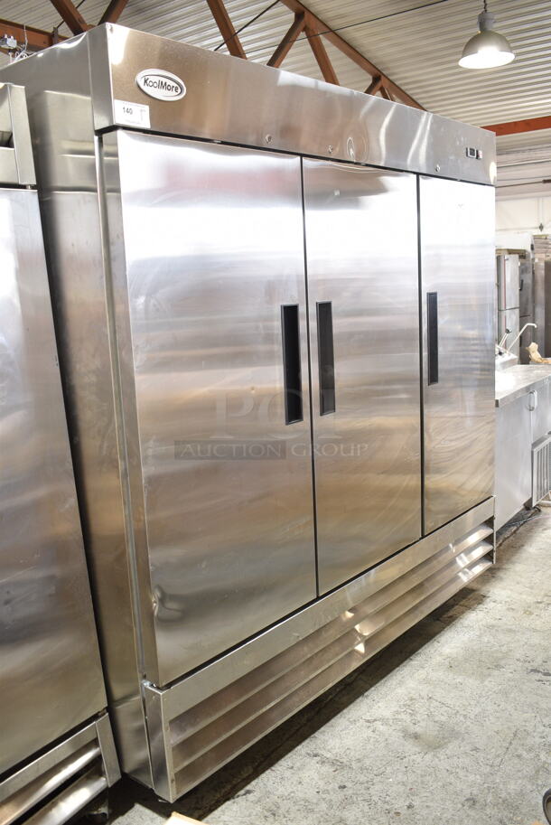 KoolMore RIF-3D-SS Stainless Steel Commercial 3 Door Reach In Freezer w/ Poly Coated Racks on Commercial Casters. 115 Volts, 1 Phase. Tested and Powers On But Does Not Get Cold - Image 1 of 7