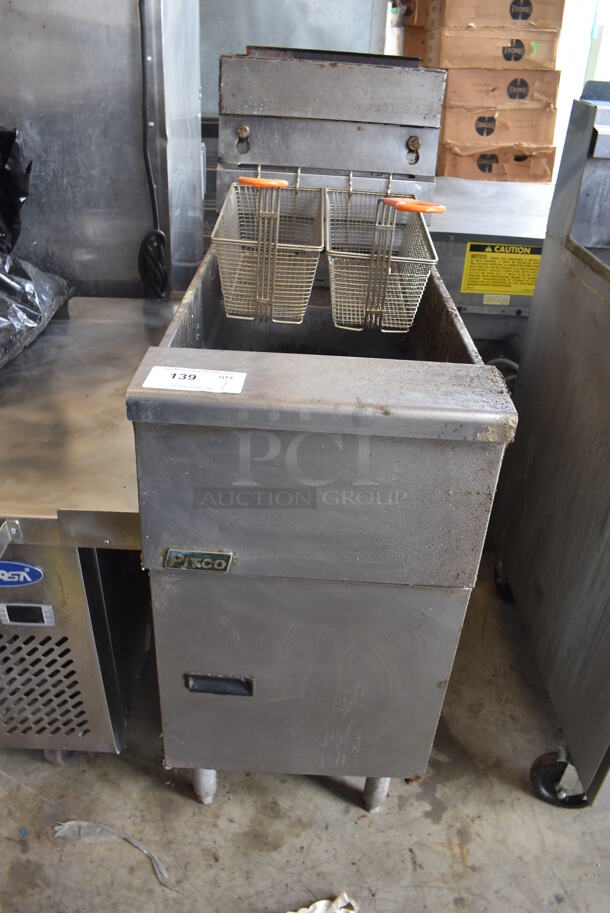 2012 Pitco Frialator SG14 Stainless Steel Commercial Floor Style Natural Gas Powered Deep Fat Fryer w/ 2 Metal Fry Baskets. 110,000 BTU.