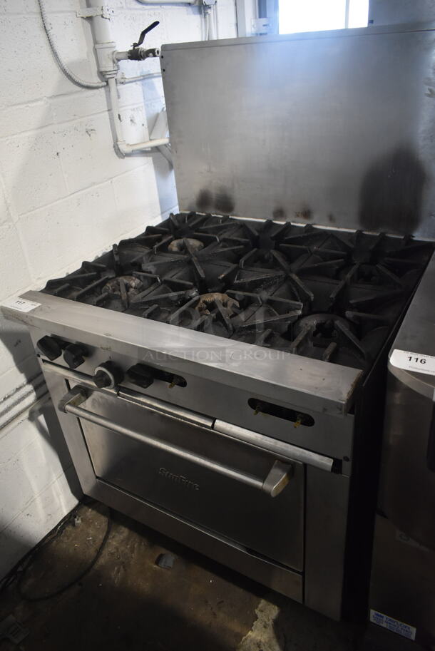 Garland SunFire X36-6R Stainless Steel Commercial Natural Gas Powered 6 Burner Range w/ Oven and Back Splash. - Image 1 of 8